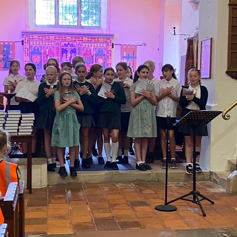 Yr 6's singing their favourite hymn at the end of term service